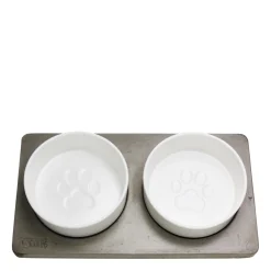 Porcelain bowls on concrete slab